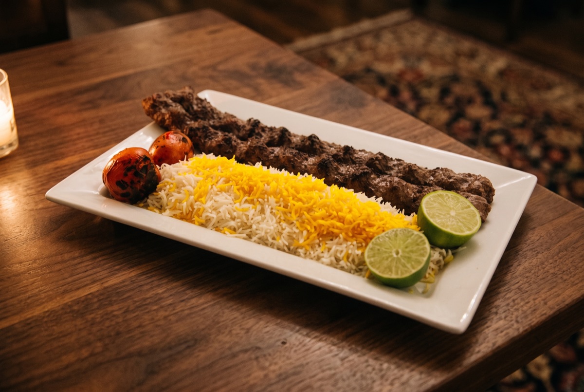 Beef Koobideh Kebab (2 Skewers) · Seasoned ground beef hand-shaped onto skewers and charcoal-grilled to a smoky char, two…
