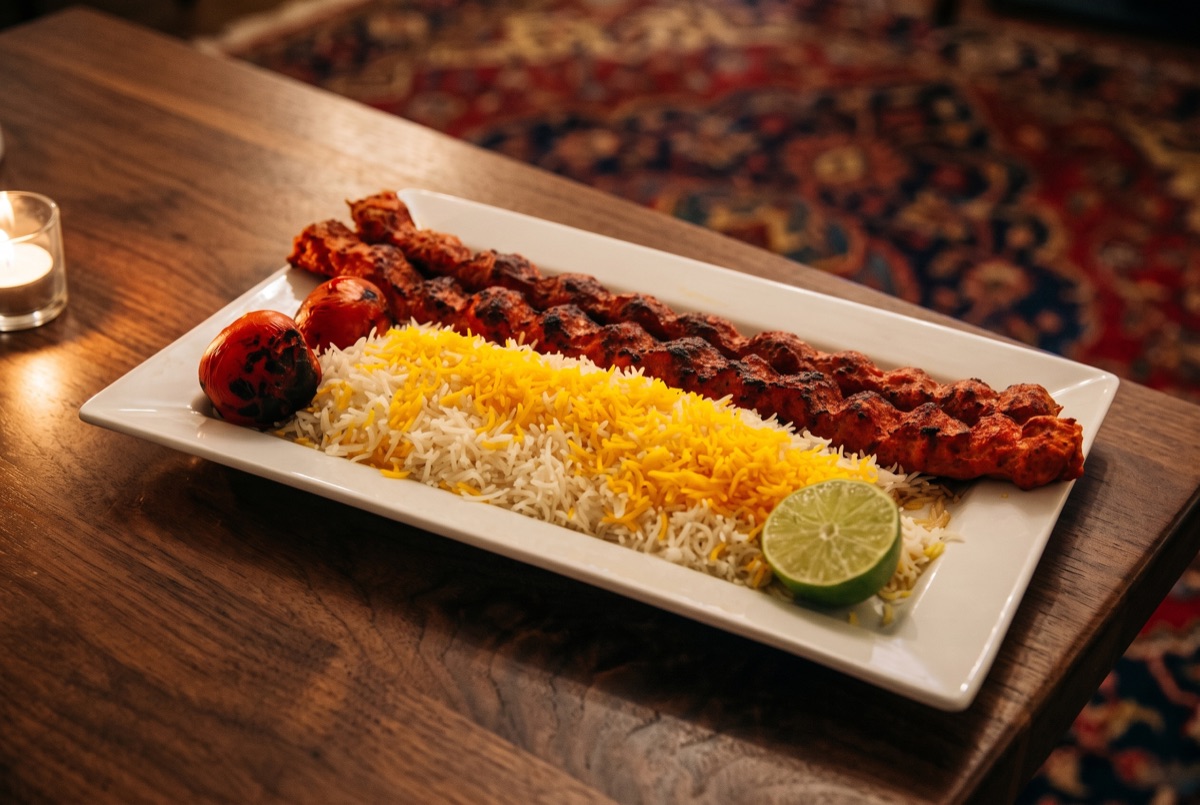 Chicken Koobideh Kebab (2 Skewers) · Two skewers of juicy strips of charbroiled seasoned ground chicken and a side of basmati…