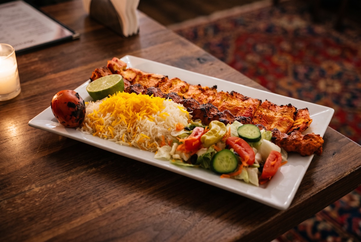 Chicken Soltani Kebab · Saffron chicken fillet paired with charcoal-grilled ground chicken koobideh on one skewer, the Soltani…