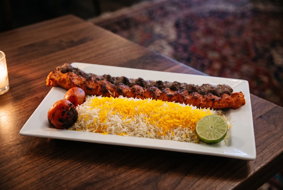 Combo Kebab M1 · A charcoal-grilled combination platter of classic Persian kebabs, skewer-seared over open flame until smoky,…