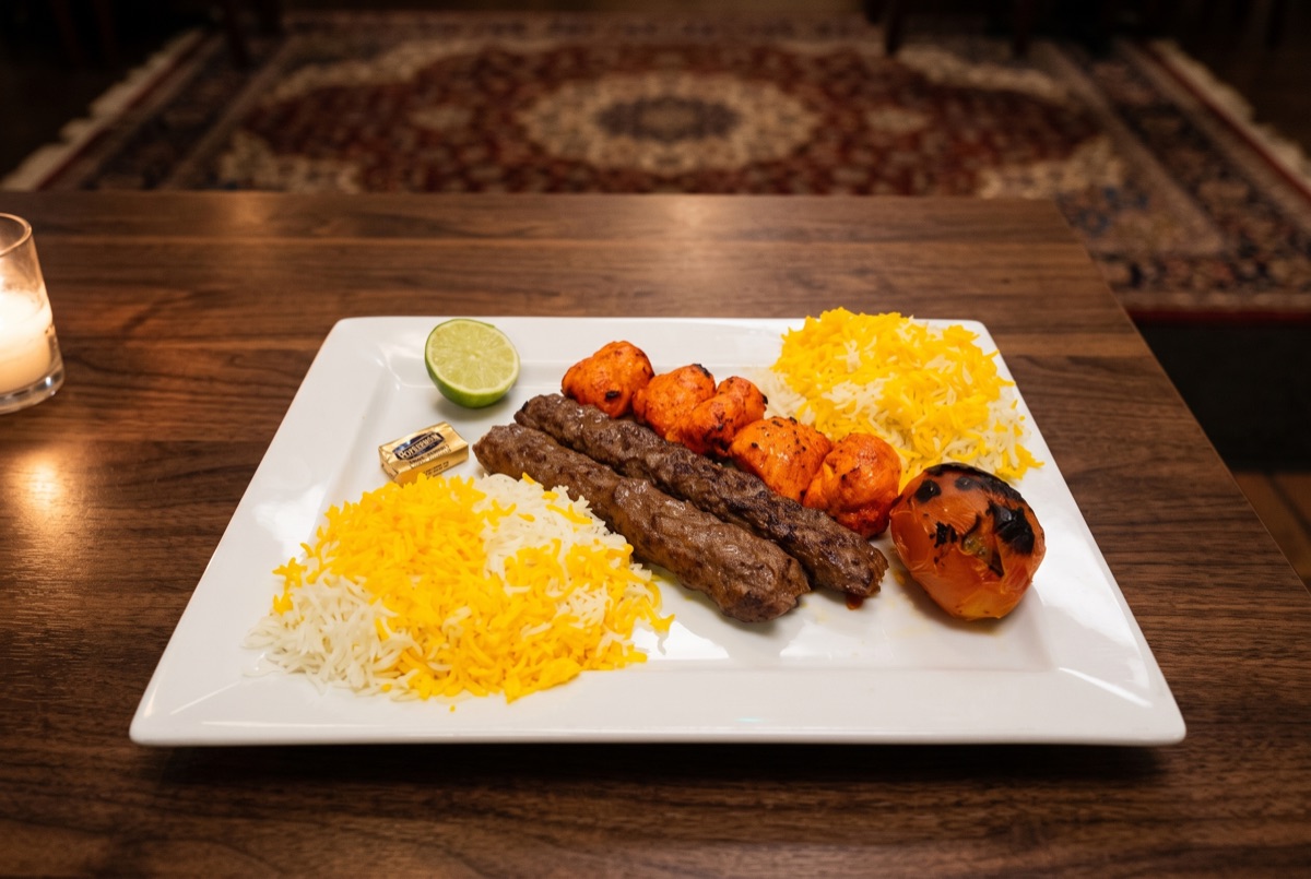 Combo Kebab M2 · A charcoal-grilled combination platter bringing together a duo of classic Persian kebabs, seared over open…
