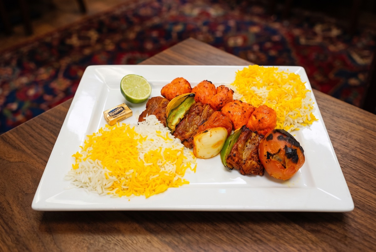 Combo Kebab M3 · A charcoal-grilled combination platter pairing several classic Persian kebabs, skewer-seared over open flame…