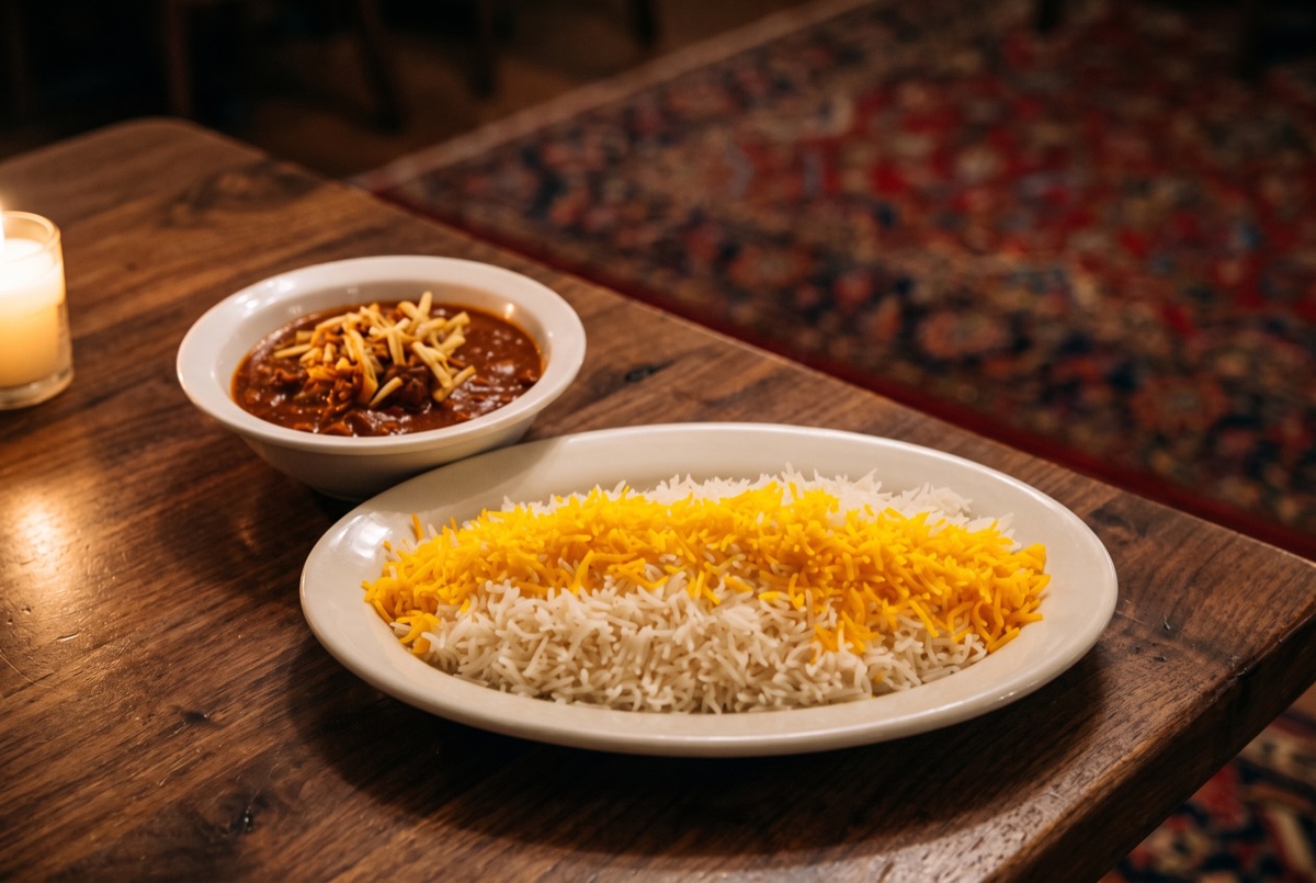 Vegetarian Gheymeh · Persian split pea and tomato stew simmered with dried lime and saffron, topped with crisp golden potato…