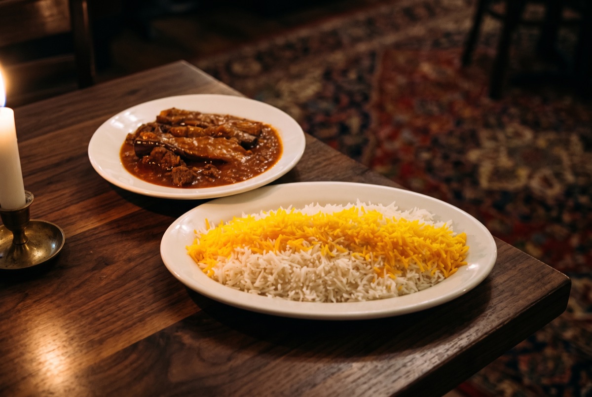 Khoresht Bademjan · Persian stew of tender eggplant slow-simmered in a saffron-tomato sauce, its tang deepened with dried…