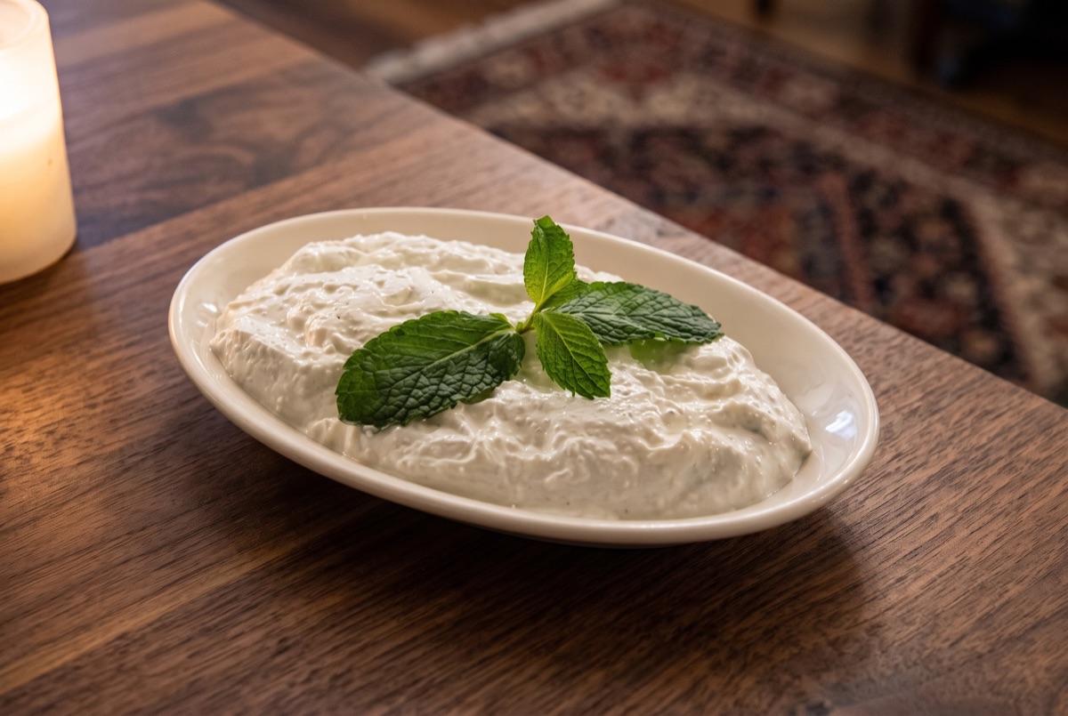 Mast o Mousir · Thick yogurt blended with dried Persian shallot (mousir), yielding a tangy, mellow dip with a subtle savory bite.