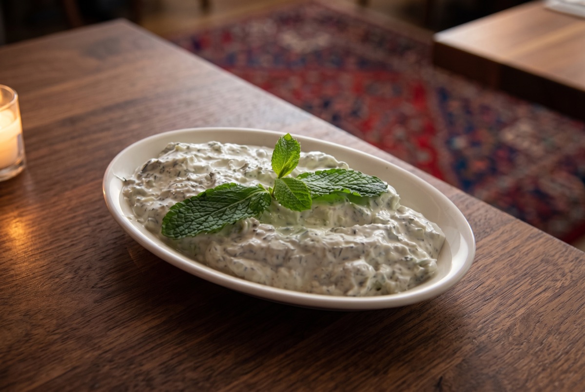 Small Tzatziki · Strained yogurt folded with grated cucumber, garlic, and fresh dill, a cool, tangy Mediterranean dip served…