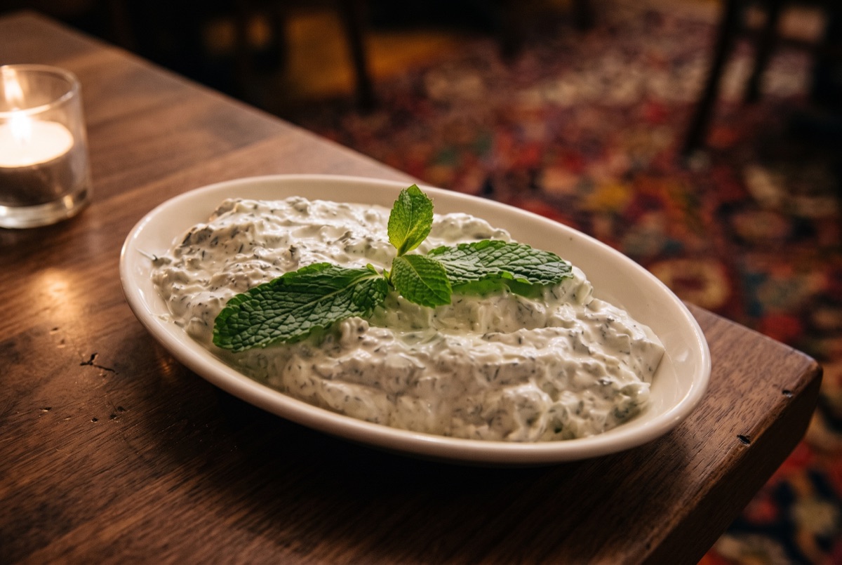 Tzatziki · Strained yogurt whisked with grated cucumber, garlic, and fresh dill, finished with olive oil, a cool, tangy…