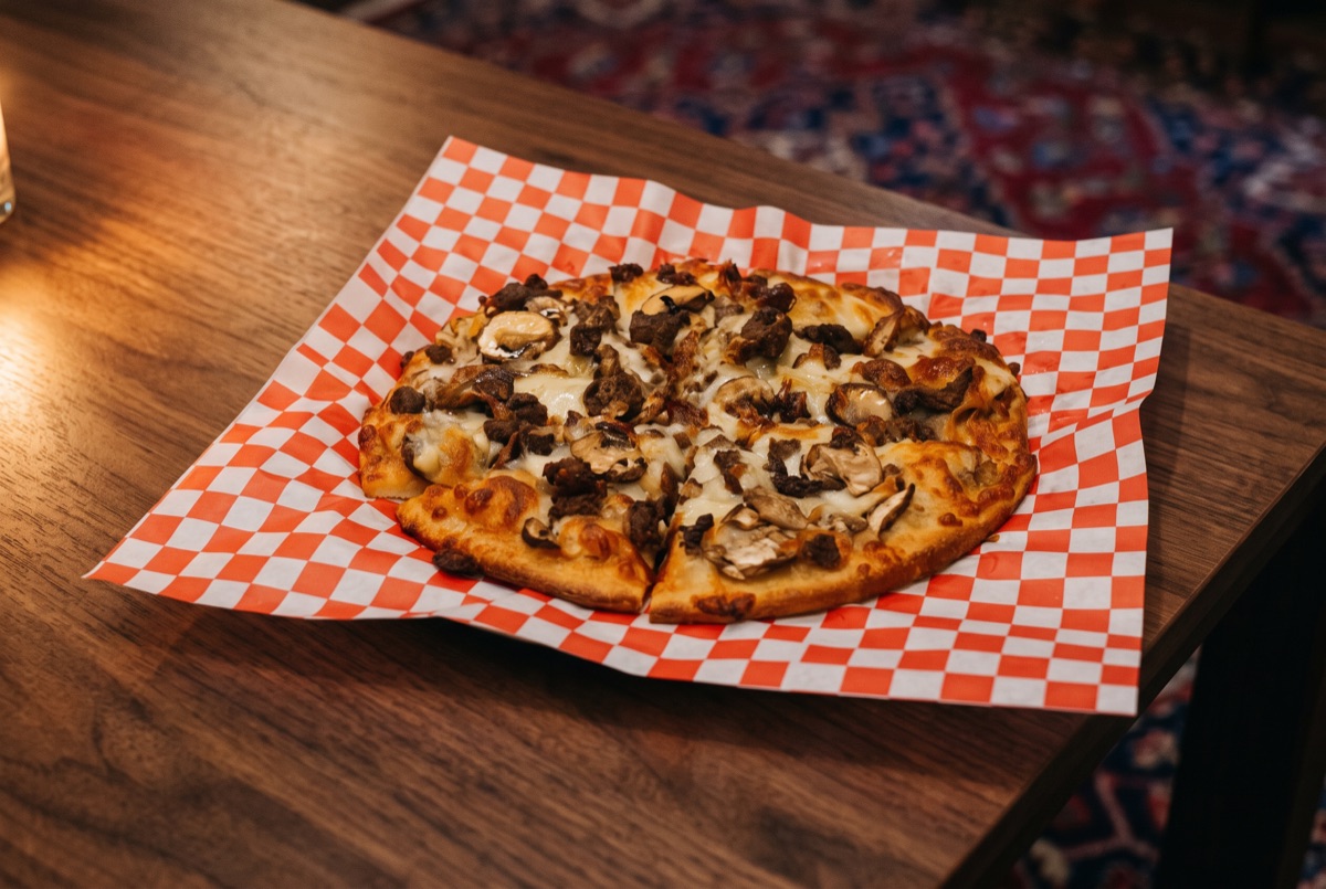 Zaban Pizza · Beef Tongue, Mushroom, Parsley, Cheese, Onion